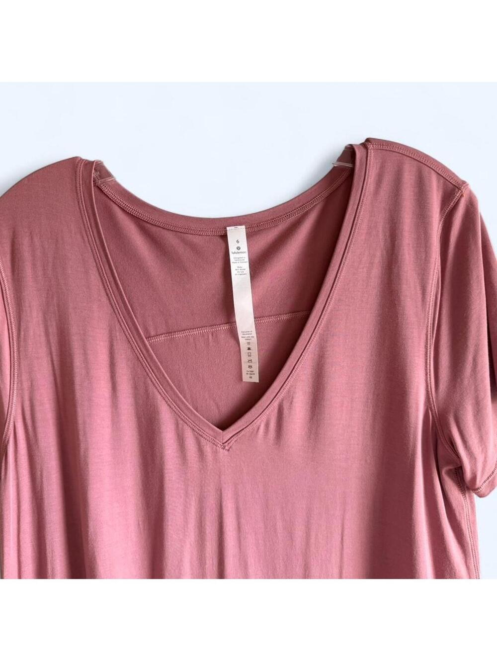 Lululemon pink asymmetrical v neck top Size 6